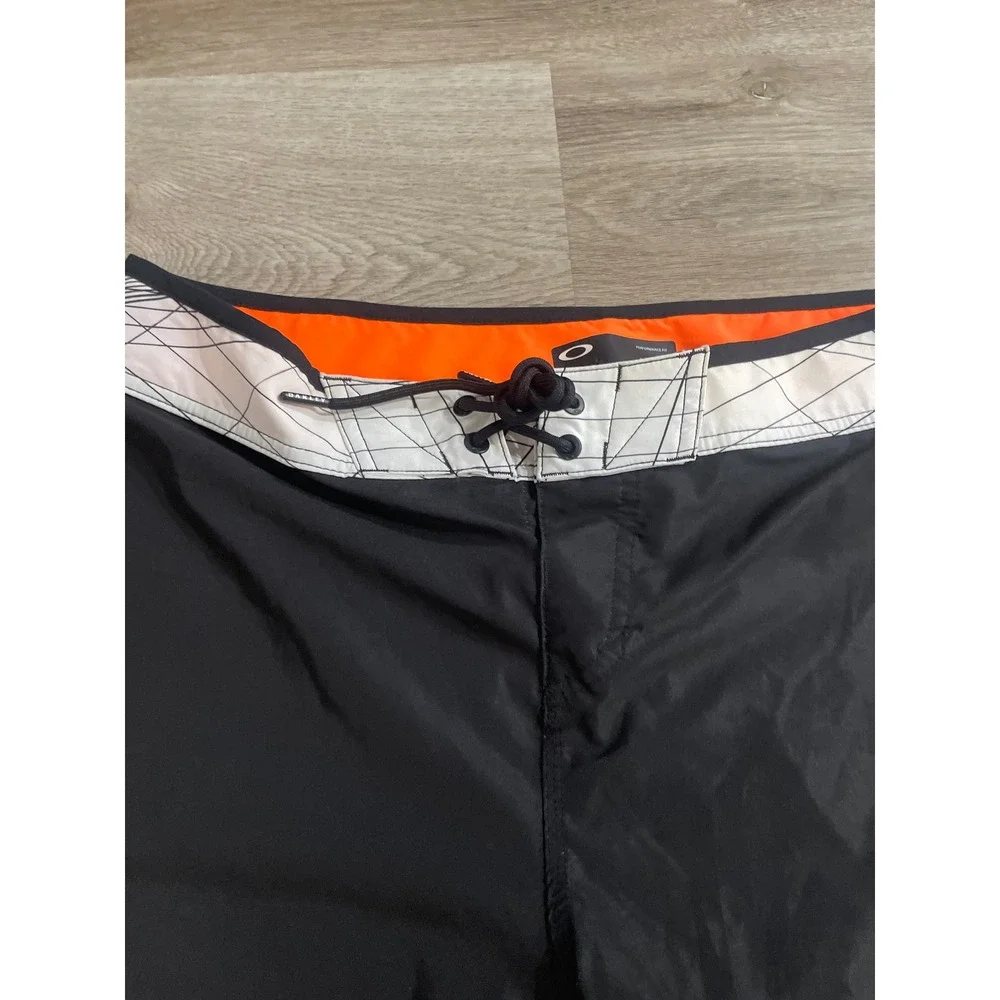 Oakley Geo Ellipse 18 Boardshorts Mens 33 Black Orange 482446-02E Surf Swim